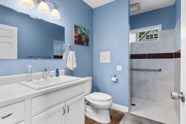 36-2331 Old Mamalahoa Hwy, Laupahoehoe, HI 96764 - full bathroom with toilet, vanity, tiled shower, and baseboards