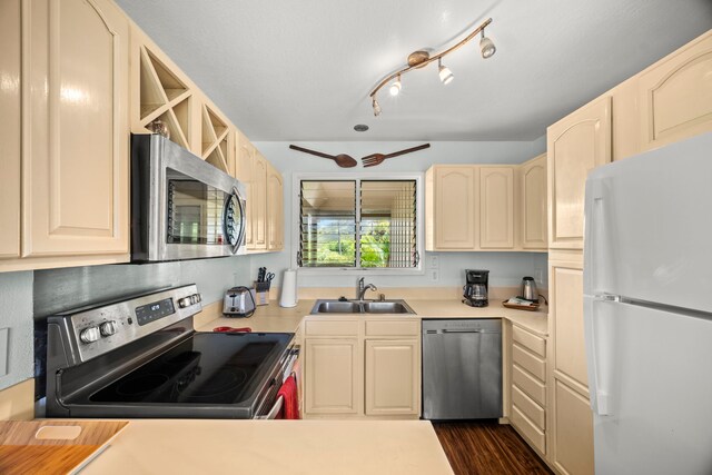 4460 Nehe Rd Unit 228, Lihue, HI 96766 - kitchen with stainless steel appliances, light countertops, and dark wood finished floors