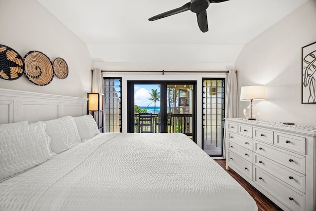 4460 Nehe Rd Unit 228, Lihue, HI 96766 - bedroom with vaulted ceiling, access to exterior, dark wood-style floors, and ceiling fan