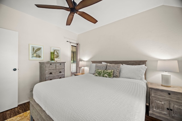 4460 Nehe Rd Unit 228, Lihue, HI 96766 - bedroom with dark wood-style flooring and a ceiling fan