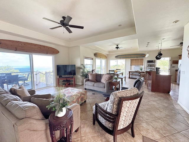 77-6450 Walua Rd, Kailua-Kona, HI 96740 - living room featuring ceiling fan, a raised ceiling, light tile patterned floors, and crown molding