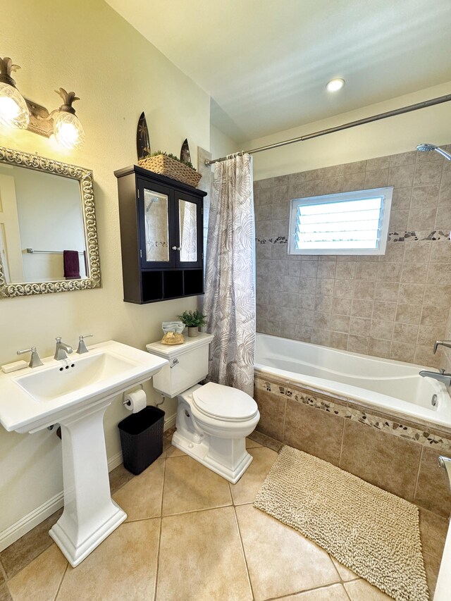 77-6450 Walua Rd, Kailua-Kona, HI 96740 - bathroom featuring tiled shower / bath combo, toilet, tile patterned floors, and a sink