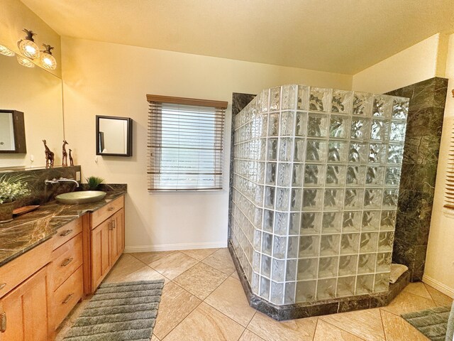 77-6450 Walua Rd, Kailua-Kona, HI 96740 - bathroom with vanity, a walk in shower, tile patterned floors, and baseboards
