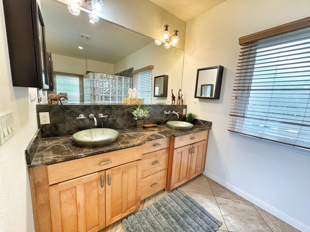 77-6450 Walua Rd, Kailua-Kona, HI 96740 - full bathroom featuring double vanity, tile patterned flooring, a walk in shower, and baseboards