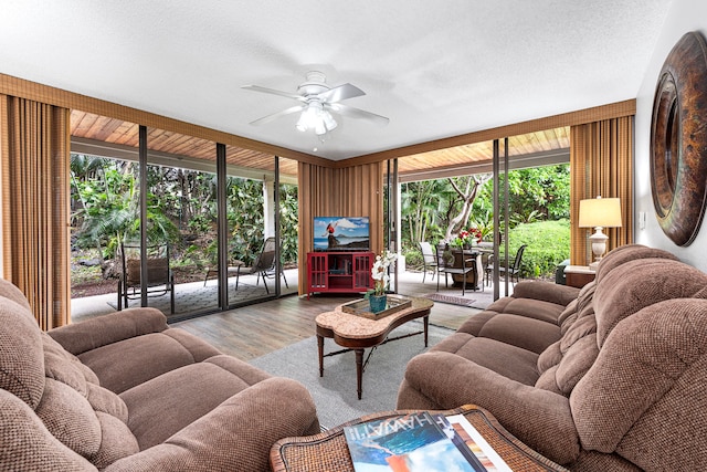 78-6800 Alii Dr Unit 8104, Kailua-Kona, HI 96740 - living room with wood finished floors and a ceiling fan