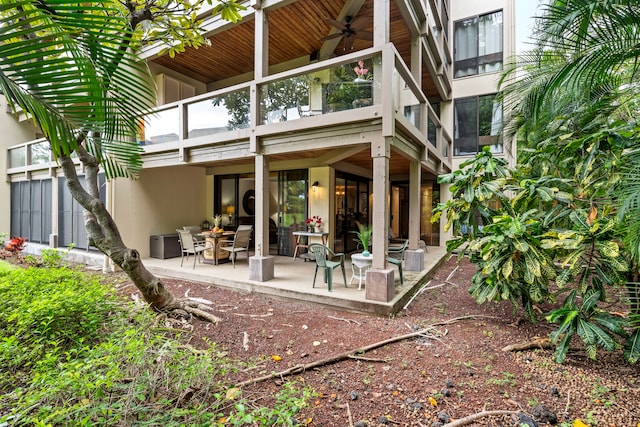 78-6800 Alii Dr Unit 8104, Kailua-Kona, HI 96740 - rear view of property with a balcony, a ceiling fan, and a patio area