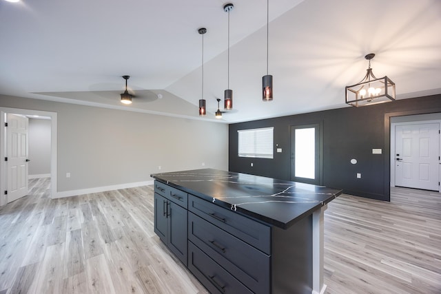 15-1776 6th Ave, Keaau, HI 96749 - kitchen with dark countertops, light wood finished floors, decorative light fixtures, and vaulted ceiling