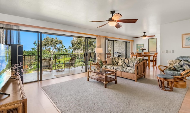 78-7070 Alii Dr Unit C201, Kailua-Kona, HI 96740 - living room featuring ceiling fan and wood finished floors