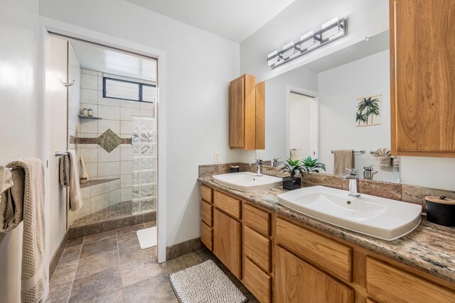 78-7070 Alii Dr Unit C201, Kailua-Kona, HI 96740 - full bath featuring double vanity, a stall shower, baseboards, and stone finish flooring