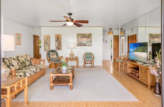 78-7070 Alii Dr Unit C201, Kailua-Kona, HI 96740 - living room with wood finished floors and ceiling fan