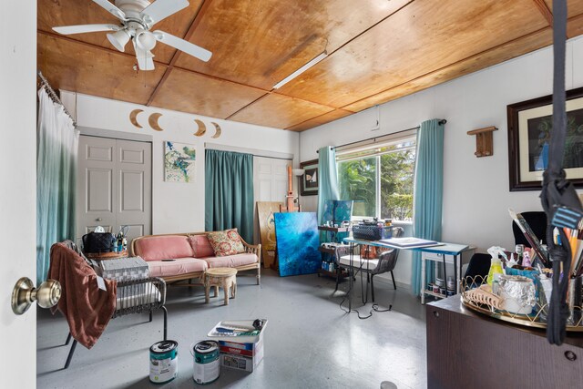 15-1385 Makuu Dr, Keaau, HI 96749 - living area with finished concrete flooring and a ceiling fan