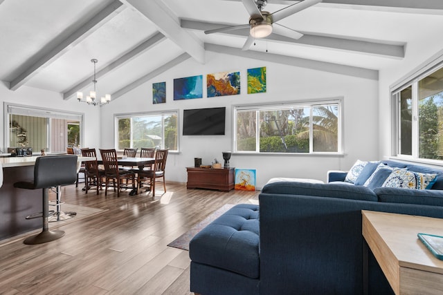 15-1385 Makuu Dr, Keaau, HI 96749 - living room with plenty of natural light, a chandelier, wood finished floors, and a ceiling fan