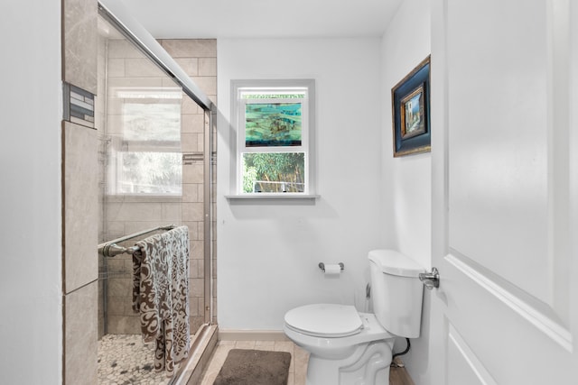 15-1385 Makuu Dr, Keaau, HI 96749 - full bathroom with toilet, a stall shower, baseboards, and tile patterned floors