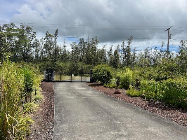 16-553 Orchidland Dr, Kurtistown, HI 96760 - view of road featuring a gate