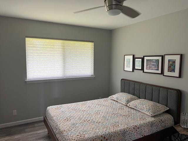 16-553 Orchidland Dr, Kurtistown, HI 96760 - bedroom featuring wood finished floors and ceiling fan