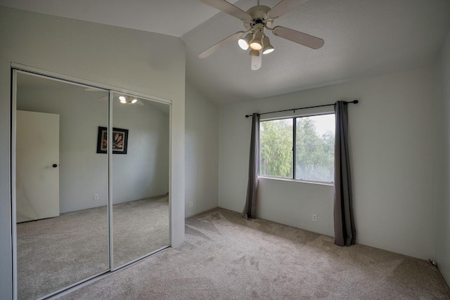 68-1780 Puu Nui St, Waikoloa, HI 96738 - unfurnished bedroom with carpet floors, lofted ceiling, a closet, and ceiling fan