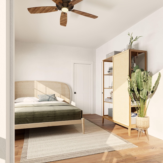 5460 Koloa Rd, Koloa, HI 96756 - bedroom with light wood finished floors and a ceiling fan