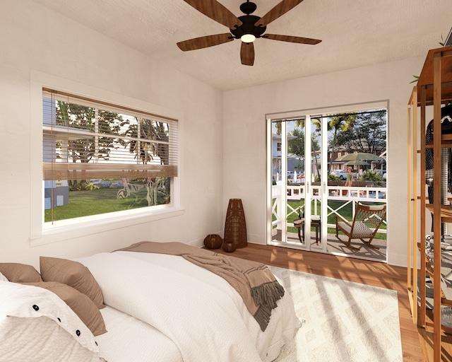 5460 Koloa Rd, Koloa, HI 96756 - bedroom featuring wood finished floors, access to exterior, and a ceiling fan