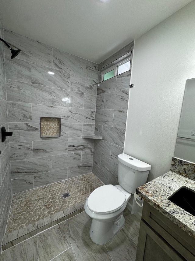16-2045 Hanale Dr, Pahoa, HI 96778 - bathroom with vanity, toilet, and a tile shower