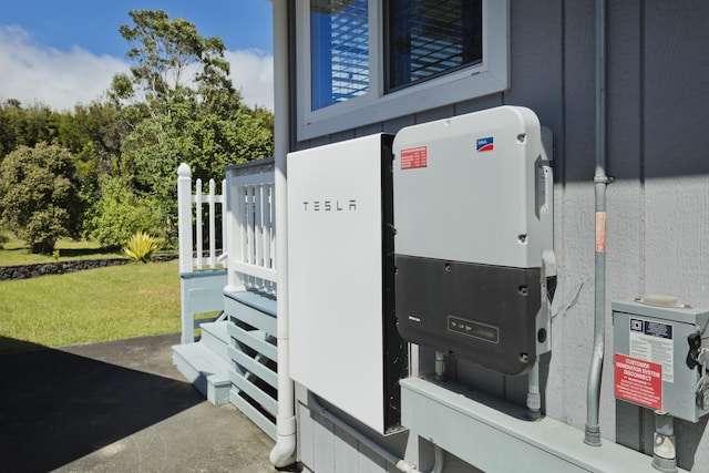 99-1808 Kilau Way, Volcano, HI 96785 - exterior view of wall-mounted power storage and related energy utilities