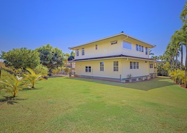 3764 Kakela Makai Dr, Kalaheo, HI 96741 - rear view of property with a lawn
