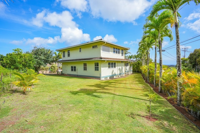 3764 Kakela Makai Dr, Kalaheo, HI 96741 - back of house with a lawn