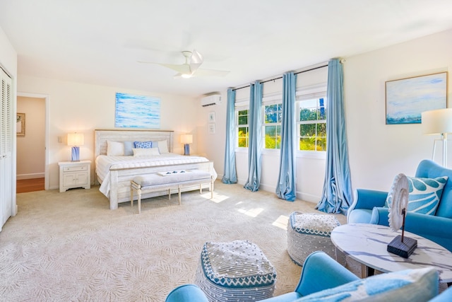 3764 Kakela Makai Dr, Kalaheo, HI 96741 - carpeted bedroom featuring a wall unit AC, a ceiling fan, and baseboards