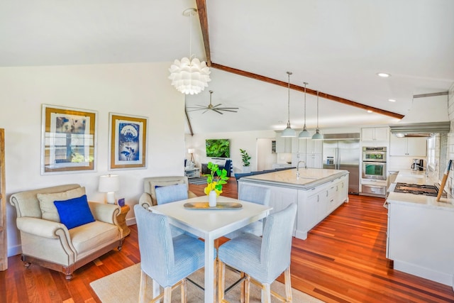 3764 Kakela Makai Dr, Kalaheo, HI 96741 - dining room with wood finished floors, a ceiling fan, and recessed lighting