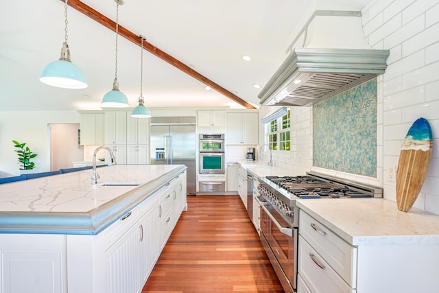 3764 Kakela Makai Dr, Kalaheo, HI 96741 - kitchen featuring high end appliances, a sink, backsplash, recessed lighting, and light stone counters