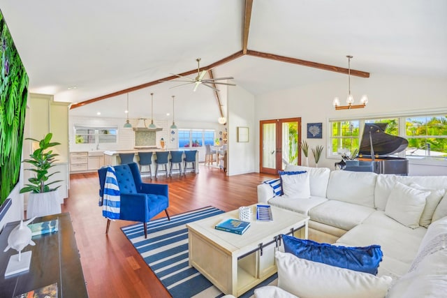 3764 Kakela Makai Dr, Kalaheo, HI 96741 - living area with wood finished floors, a ceiling fan, french doors, a chandelier, and recessed lighting