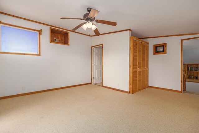 66-1665-A Kawaihae Rd, Kamuela, HI 96743 - unfurnished bedroom featuring carpet floors, ornamental molding, a closet, and a ceiling fan