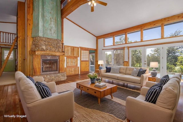 66-1665-A Kawaihae Rd, Kamuela, HI 96743 - living room featuring high vaulted ceiling, hardwood / wood-style flooring, ceiling fan, a fireplace, and plenty of natural light