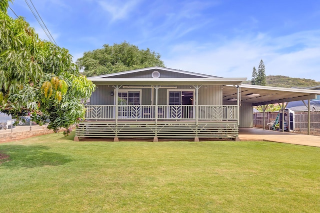 5045 Menehune Rd, Waimea, HI 96796 - view of front of house featuring concrete driveway and an attached carport