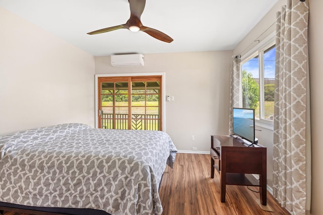 5045 Menehune Rd, Waimea, HI 96796 - bedroom featuring access to outside, wood finished floors, a wall mounted air conditioner, and a ceiling fan