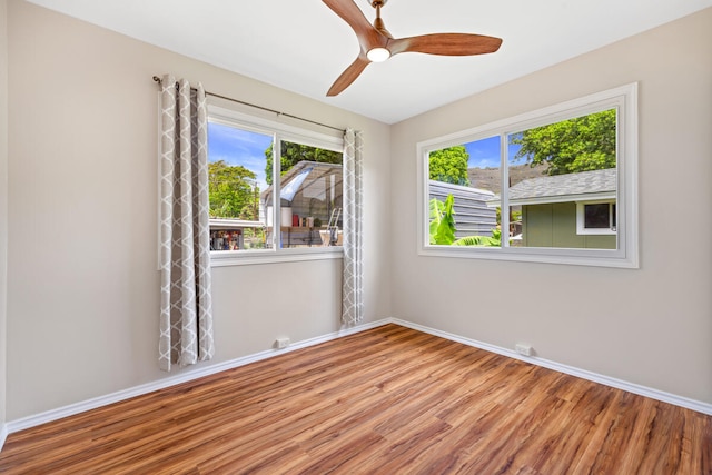 5045 Menehune Rd, Waimea, HI 96796 - spare room with wood finished floors and a ceiling fan
