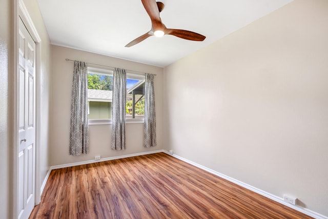 5045 Menehune Rd, Waimea, HI 96796 - spare room with wood finished floors and a ceiling fan