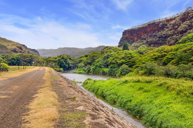 5045 Menehune Rd, Waimea, HI 96796 - view of dirt / gravel road with a mountain view