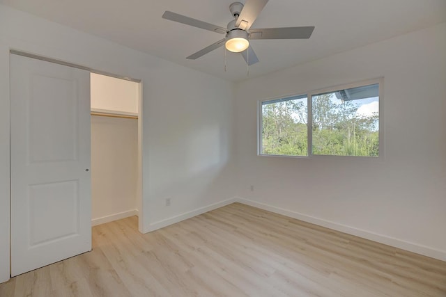 16-2075 Lilikoi Dr, Pahoa, HI 96778 - unfurnished bedroom with light wood-style flooring, a closet, and a ceiling fan