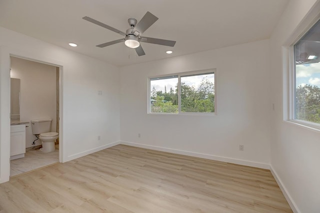 16-2075 Lilikoi Dr, Pahoa, HI 96778 - unfurnished bedroom with light wood-style floors, ensuite bath, recessed lighting, and a ceiling fan