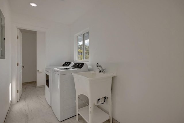 16-2075 Lilikoi Dr, Pahoa, HI 96778 - laundry room featuring separate washer and dryer, light marble finish floors, and recessed lighting