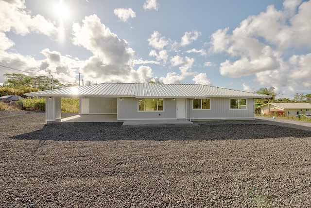 16-2075 Lilikoi Dr, Pahoa, HI 96778 - view of front of home featuring a metal roof and a carport