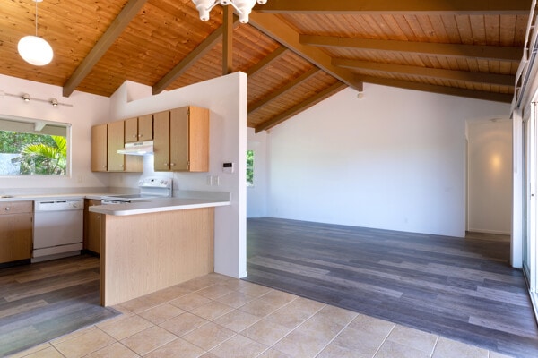 68-3750 Ua Noe Pl, Waikoloa, HI 96738 - kitchen featuring white appliances, wood ceiling, under cabinet range hood, a peninsula, and light countertops