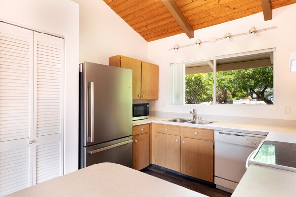 68-3750 Ua Noe Pl, Waikoloa, HI 96738 - kitchen with appliances with stainless steel finishes, a sink, wooden ceiling, and light countertops