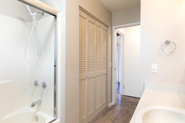 68-3750 Ua Noe Pl, Waikoloa, HI 96738 - bathroom with wood finished floors,  shower combination, a closet, and vanity