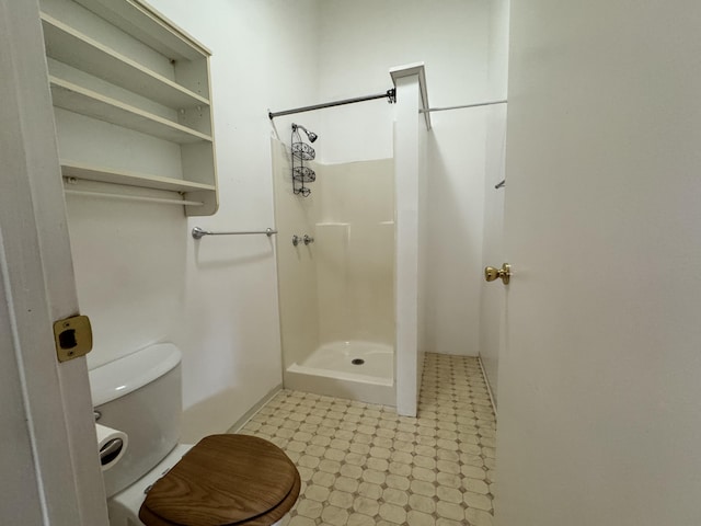 15-2015 12th Ave, Keaau, HI 96749 - bathroom featuring a stall shower, tile patterned floors, and toilet