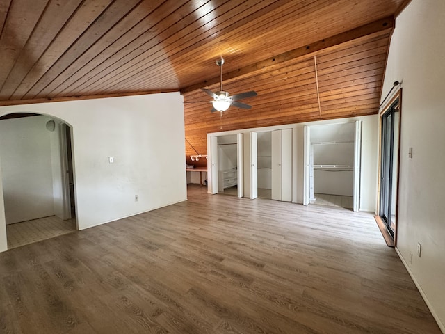 15-2015 12th Ave, Keaau, HI 96749 - empty room with arched walkways, wood ceiling, ceiling fan, and wood finished floors