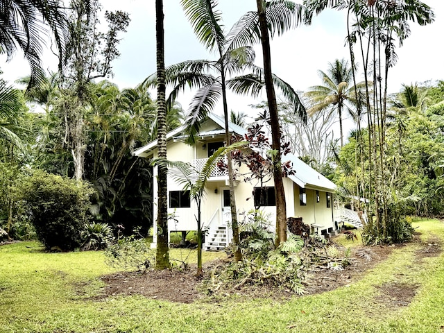 15-2015 12th Ave, Keaau, HI 96749 - view of side of property with a yard
