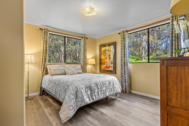11-3827 5th St, Volcano, HI 96785 - bedroom with baseboards and wood finished floors