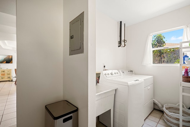 2640 Keoki Pl, Kalaheo, HI 96741 - laundry room with electric panel, washing machine and dryer, and light tile patterned floors