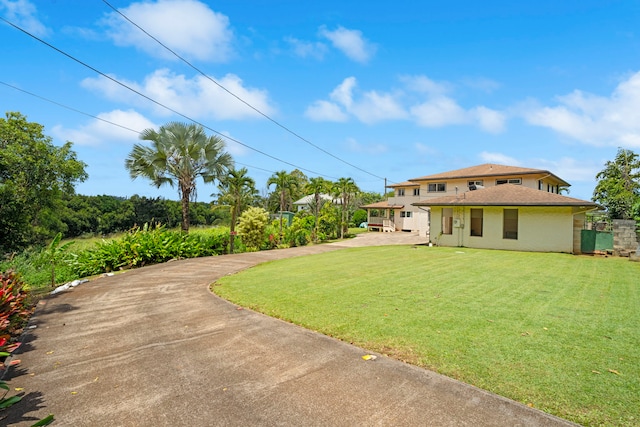 2640 Keoki Pl, Kalaheo, HI 96741 - view of green lawn featuring asphalt driveway